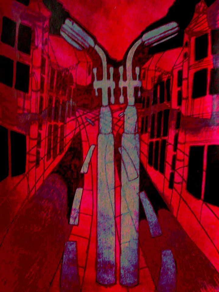 Street between red buildings with a double streetlamp