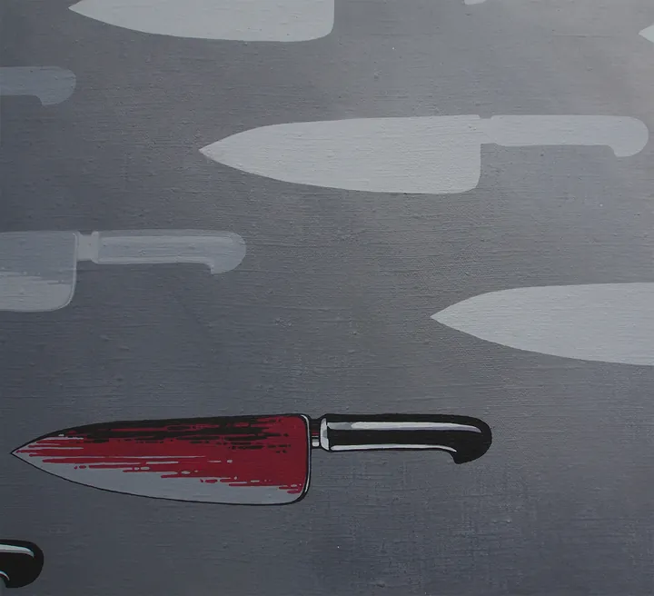 Detail of grey knives and one blood-red knife