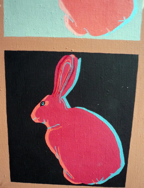 Detail of a pink rabbit silhouette on black