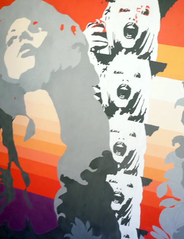 Detail of the screaming faces over orange stripes